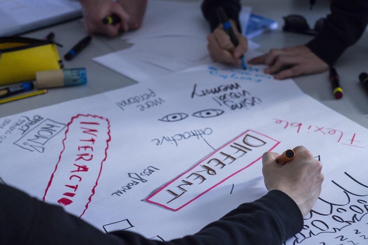 Designers developing a brand identity system